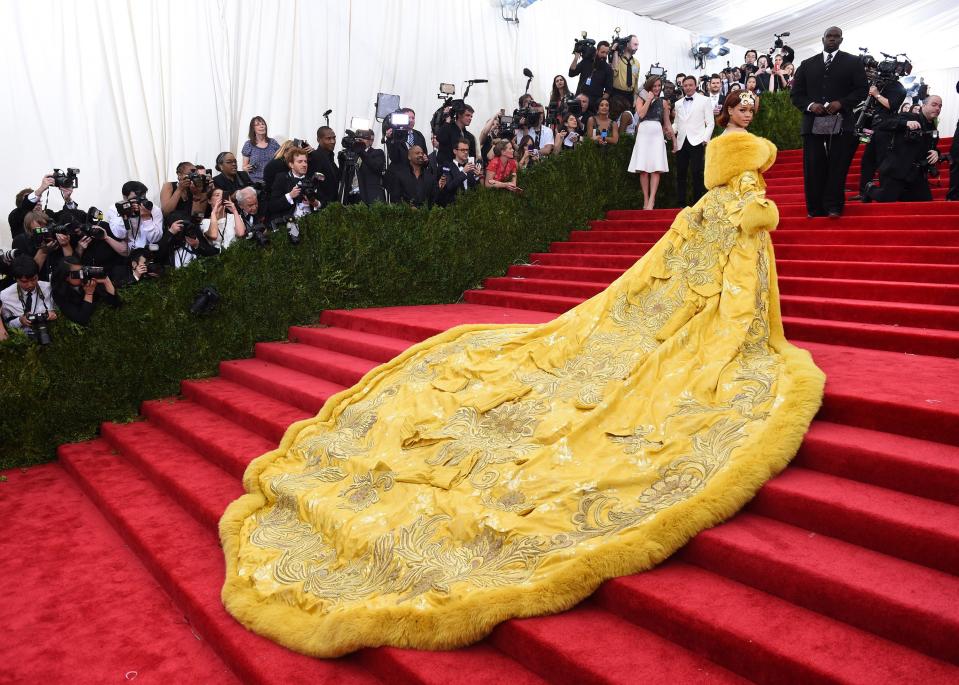 Rihanna’s 16-foot train, Cher’s naked dress, and Katy Perry’s angel wings included.