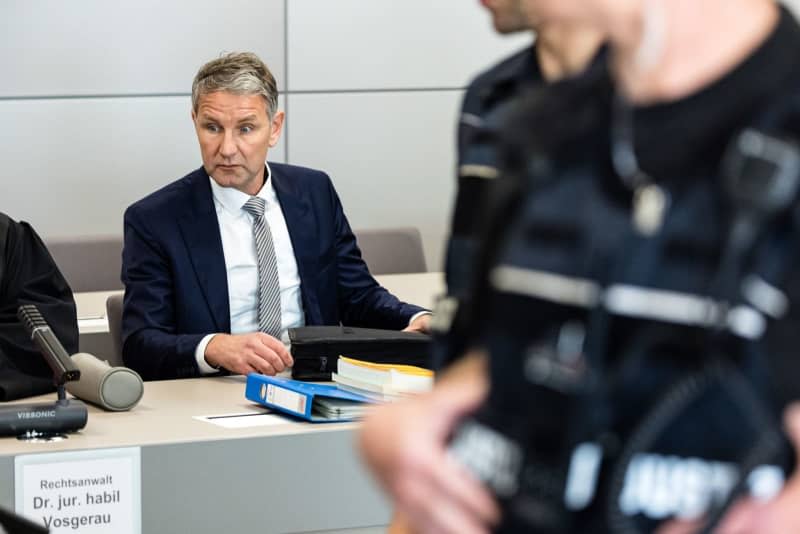 Bjoern Hoecke, chairman of the Thuringian AfD, attends his trial at the regional court. He is accused of using symbols of unconstitutional and terrorist organizations. Jens Schlueter/AFP Pool/dpa
