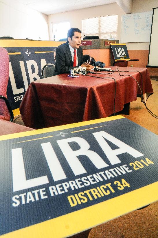 Christian Lira holds a meeting to announce that he will be running for state representative for District 34 while maintaining his seat as Sunland Park City Councilor on Friday, March 7, 2014, at City Hall in Las Cruces, NM. (AP Photo/Las Cruces Sun-News, Robin Zielinski)