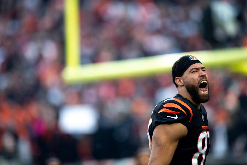 Cincinnati Bengals tight end CJ Uzomah (87) shouts during player introductions before the AFC wild card game on Saturday, Jan. 15, 2022, at Paul Brown Stadium in Cincinnati. The Cincinnati Bengals defeated the Las Vegas Raiders 26-19. Las Vegas Raiders at the Cincinnati Bengals Playoffs Ac 207