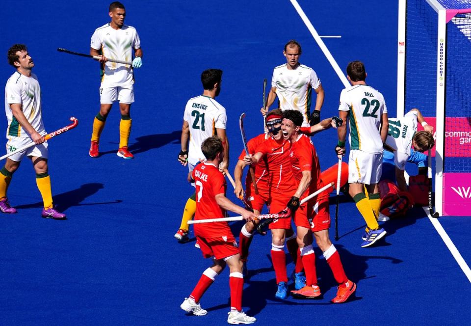 England’s Phil Roper celebrates scoring their side’s fifth goal in the bronze medal match victory over South Africa (Martin Rickett/PA) (PA Wire)