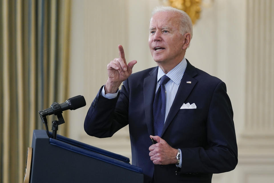 President Joe Biden takes questions from reporters as he speaks about the COVID-19 vaccination program, in the State Dining Room of the White House, Tuesday, May 4, 2021, in Washington. (AP Photo/Evan Vucci)