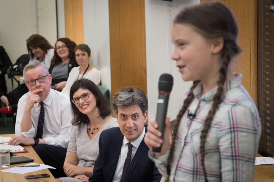 Environment Secretary Michael Gove (left), Former Labour leader Ed Miliband (2nd right) and Swedish climate activist Greta Thunberg (right) at the House of Commons in Westminster, London, to discuss the need for cross-party action to address the climate crisis. (PA)