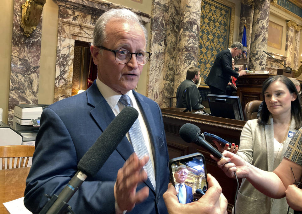 Republican Minnesota state Sen. Warren Limmer, of Maple Grove, discusses his opposition to a bill that came up for debate on the Senate floor Tuesday, Feb. 21, 2023, to restore voting rights to felons when they get out of prison before they complete their parole. (AP Photo/Steve Karnowsk)