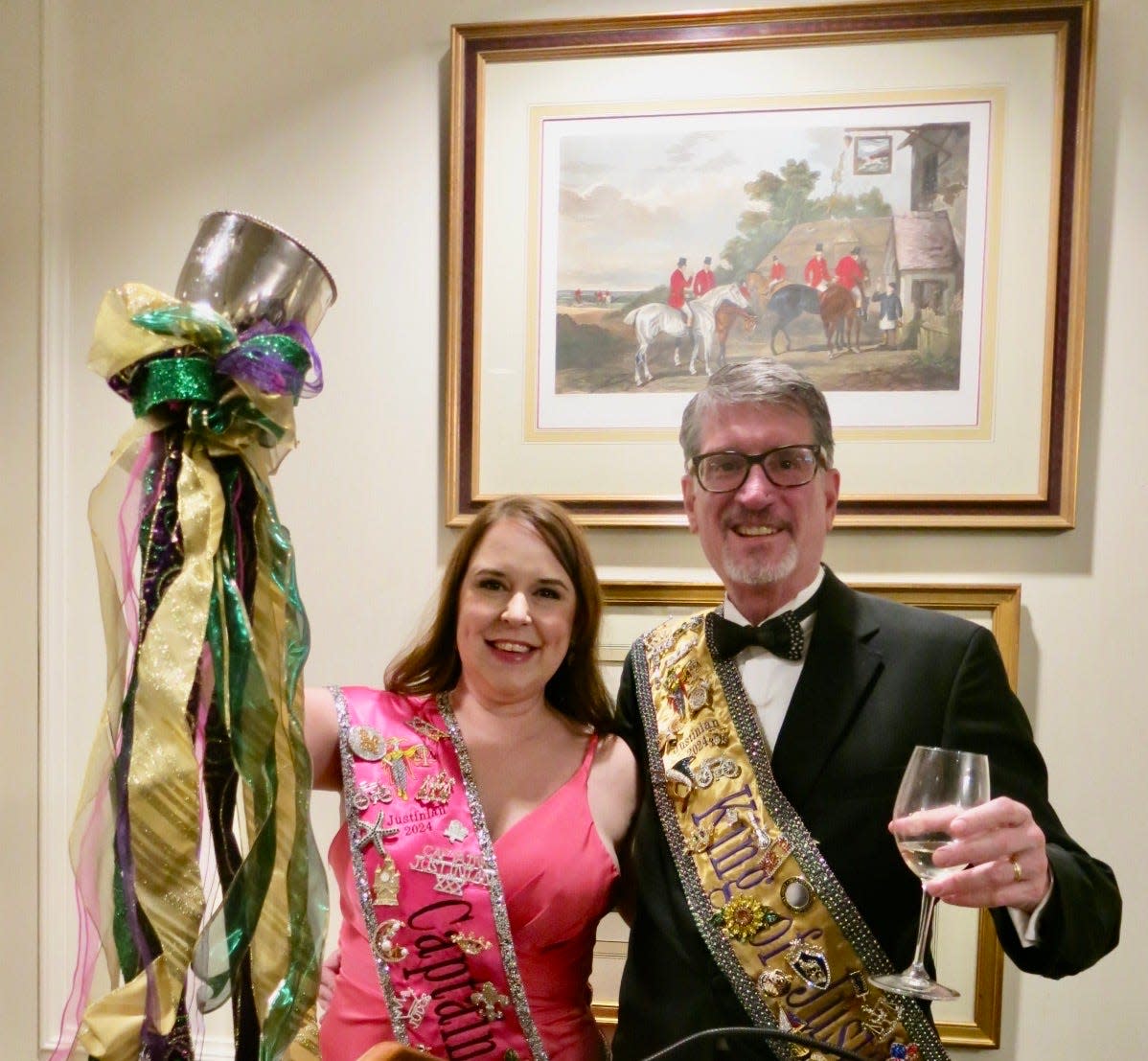 Krewe of Justinian XXX Captain Amy Day and King Judge Don Hathaway, Jr. toast the attendees at the Justinian Royalty Dinner.