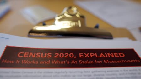 FILE PHOTO: An informational pamphlet is displayed at an event for community activists and local government leaders to mark the one-year-out launch of the 2020 Census efforts in Boston
