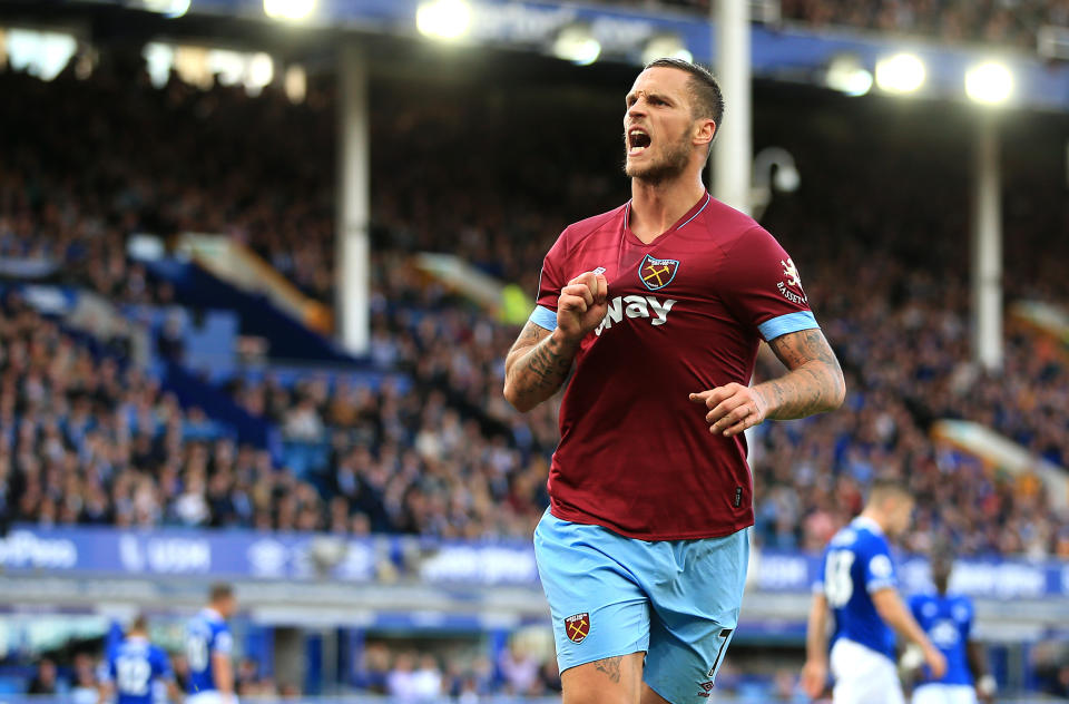 Marko Arnautovic salutes the large travelling West Ham contingent after scoring a decisive third goal