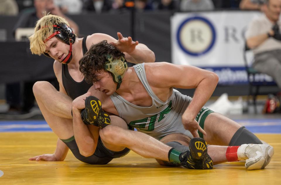 Brick Memorial freshman Harvey Ludington (behind) advanced to the 175-pound NJSIAA final with an 8-5 win over St. Joseph (Montvale's Mike Dellagatta Friday night.