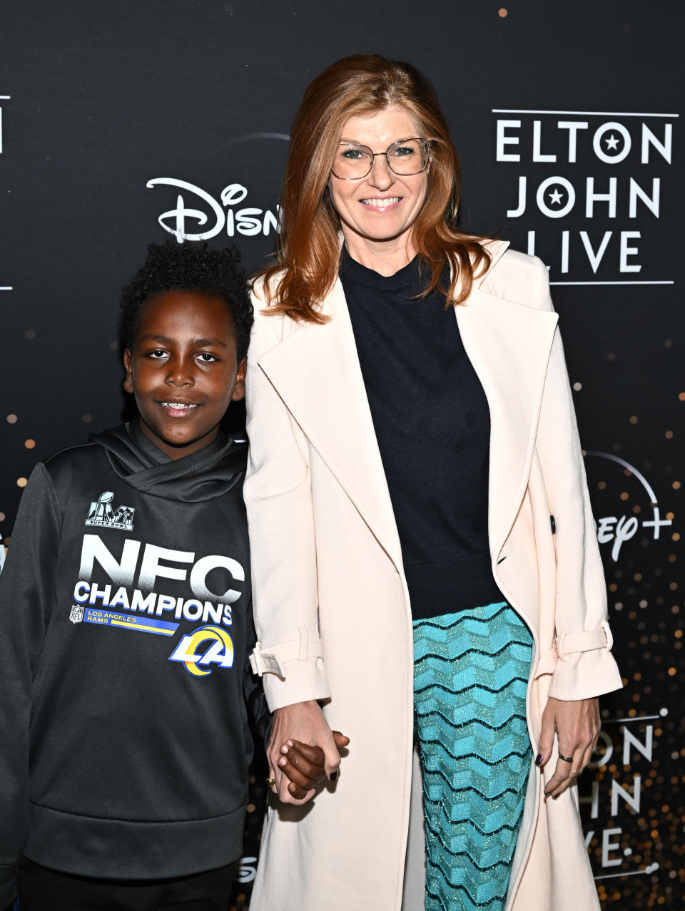 Connie Britton and son Yuby at Disney+’s “Elton John Live: Farewell from Dodger Stadium” Yellow Brick Road event held at Dodger Stadium on November 20, 2022 in Los Angeles, California.