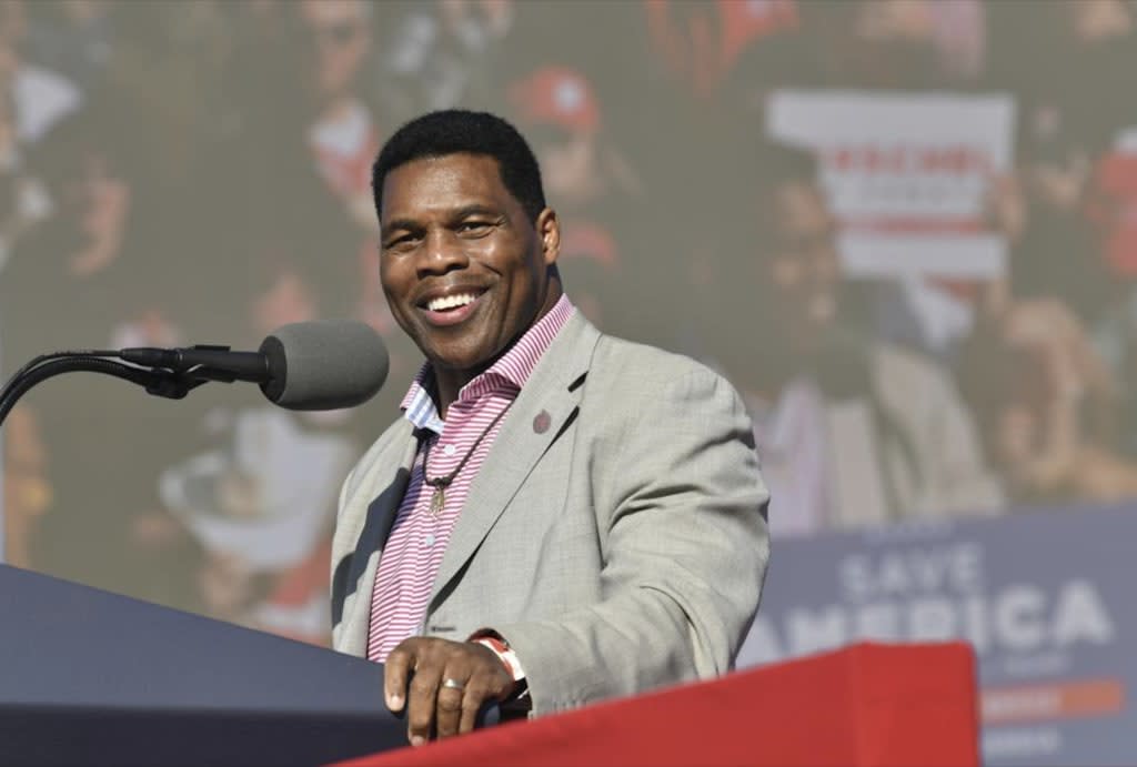 Republican U.S. Senate candidate Herschel Walker speaks during a Donald Trump rally for Georgia GOP candidates in Commerce, Ga., March 26, 2022. (Hyosub Shin/Atlanta Journal-Constitution via AP, File)