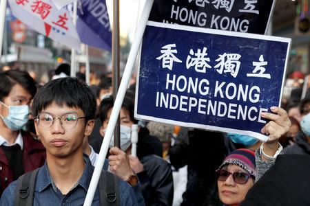 Pro-independence supporters take part in an annual New Year's Day march in Hong Kong, China January 1, 2019. REUTERS/Tyrone Siu