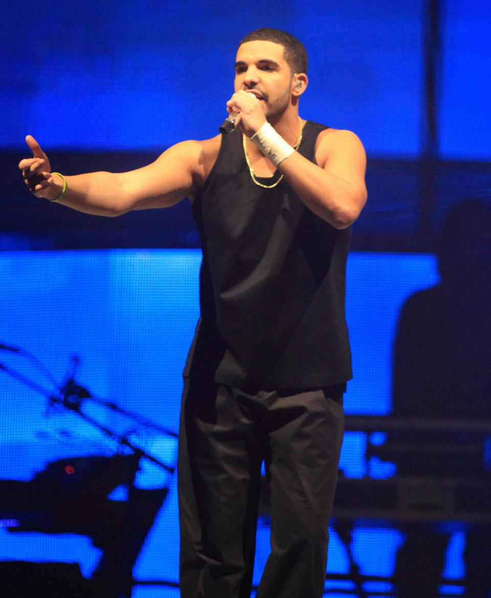 Rapper Drake performs in concert on the last date of his "Would You Like A Tour? 2013" at the Wells Fargo Center on Wednesday, Dec. 18, 2013, in Philadelphia. (Photo by Owen Sweeney/Invision/AP)