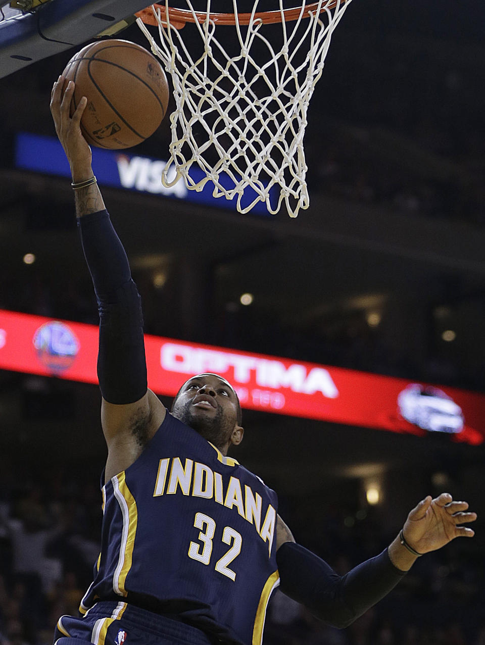 Indiana Pacers' C.J. Watson lays up a shot against the Golden State Warriors during the first half of an NBA basketball game, Monday, Jan. 20, 2014, in Oakland, Calif. (AP Photo/Ben Margot)