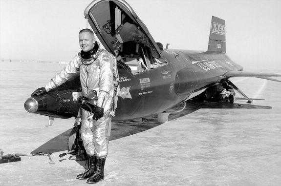 Research pilot Neil Armstrong stands with an X-15 rocketplane at NASA's Flight Research Center, Edwards, Calif., in 1960.