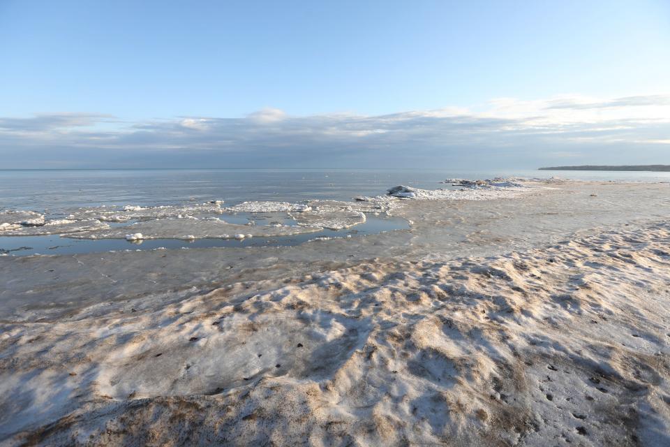  Ice build up along the shore of Lake Ontario at Durand Eastman beach area in Rochester slowly melts from recent warm temperatures.