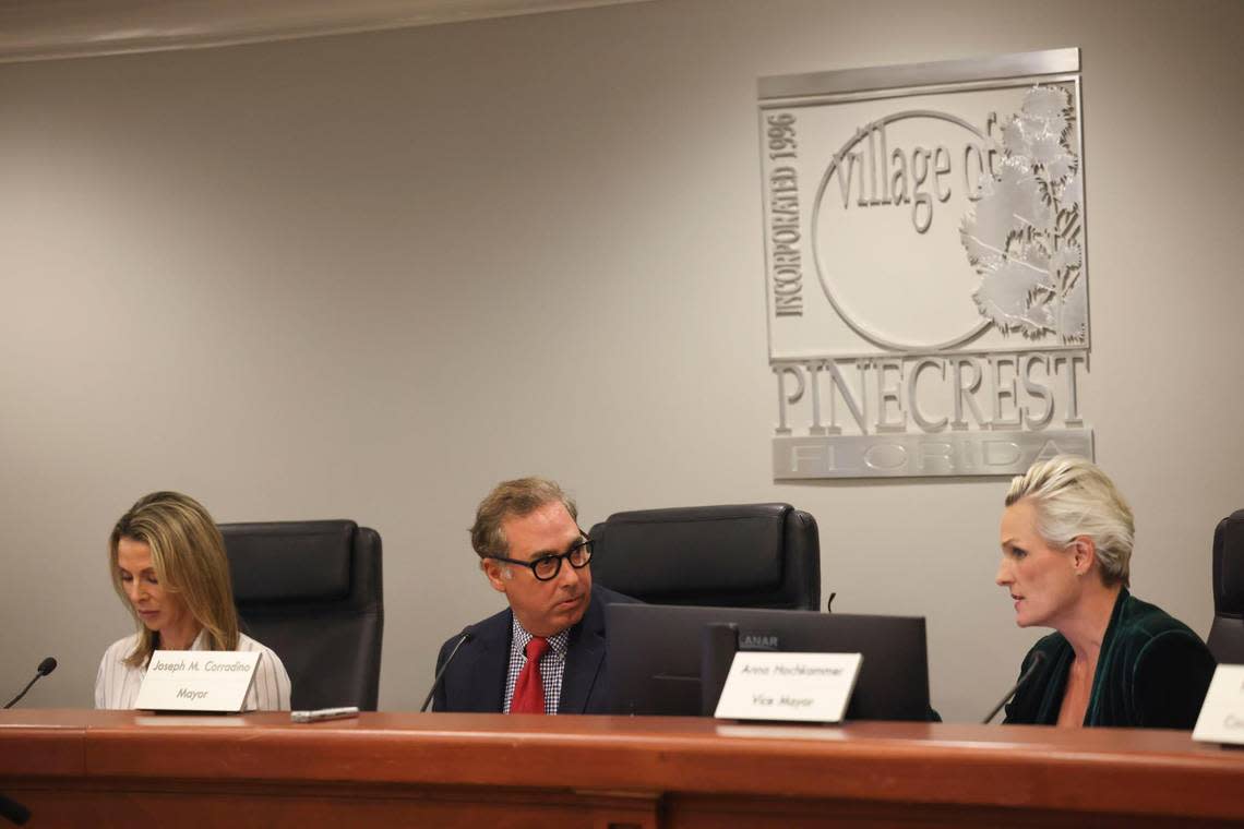 Mayor Joseph Corradino, center, speaks to council members Anna Hochkammer, Vice Mayor, right, and Shannon del Prado during a Pinecrest Village Council meeting on Tuesday, Jan. 10, 2023, in Pinecrest.