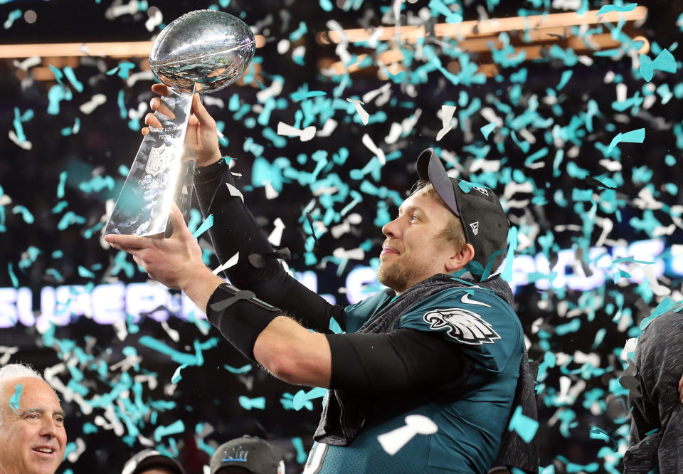 <p>Philadelphia Eagles quarterback Nick Foles (9) celebrates with the the Vince Lombardi Trophy after defeating the New England Patriots in Super Bowl LII at U.S. Bank Stadium. Mandatory Credit: Winslow Townson-USA TODAY Sports </p>