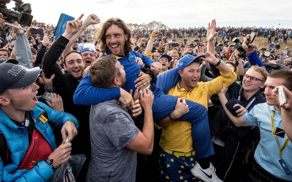 Tommy Fleetwood celebrates with the crowd at Le Golf National in 2018 - Mullets, drunken singing and F-bombs: The Ryder Cup is golf on steroids