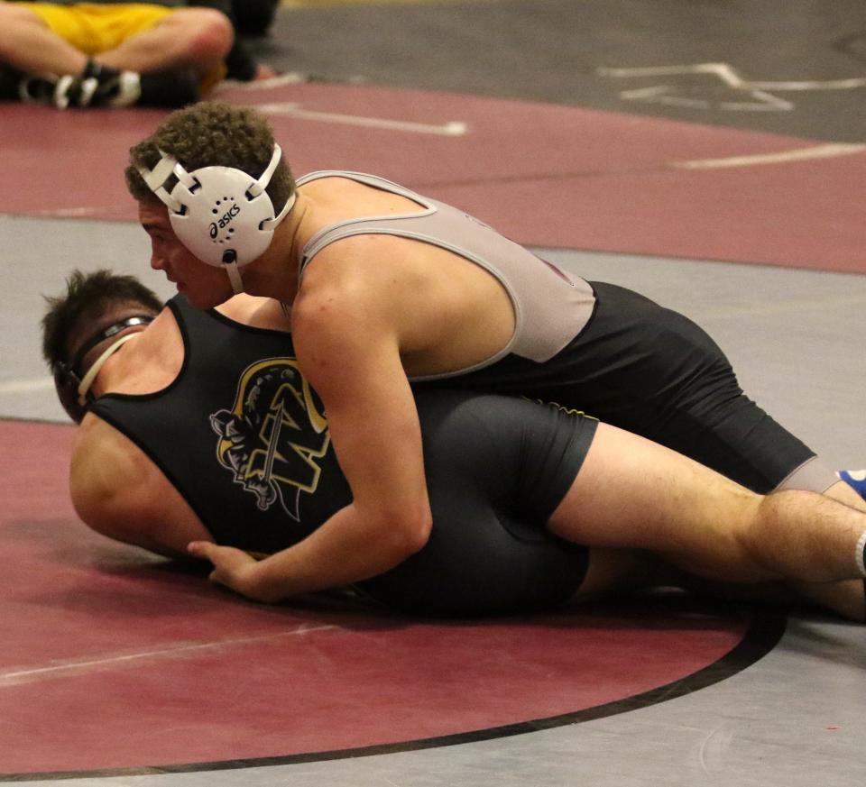 Elmira's Donavan Smith pinned Windsor's Mason McCombs in their 160-pound match at the Dave Buck Memorial Wrestling Tournament at Elmira High School on Dec. 10, 2022. The pin gave Smith the title for the weight class.