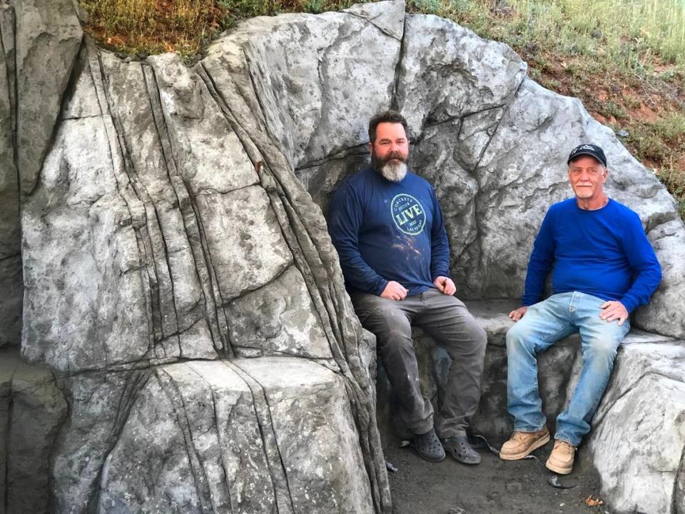 Mike Corbett, right, and Wes Segler sit on a bench they made for the Yosemite Climbing Museum & Gallery in Mariposa.