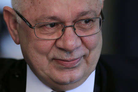 FILE PHOTO: Judge Teori Albino Zavascki smiles during his inauguration ceremony to the Supreme Court in Brasilia November 29, 2012. REUTERS/Ueslei Marcelino