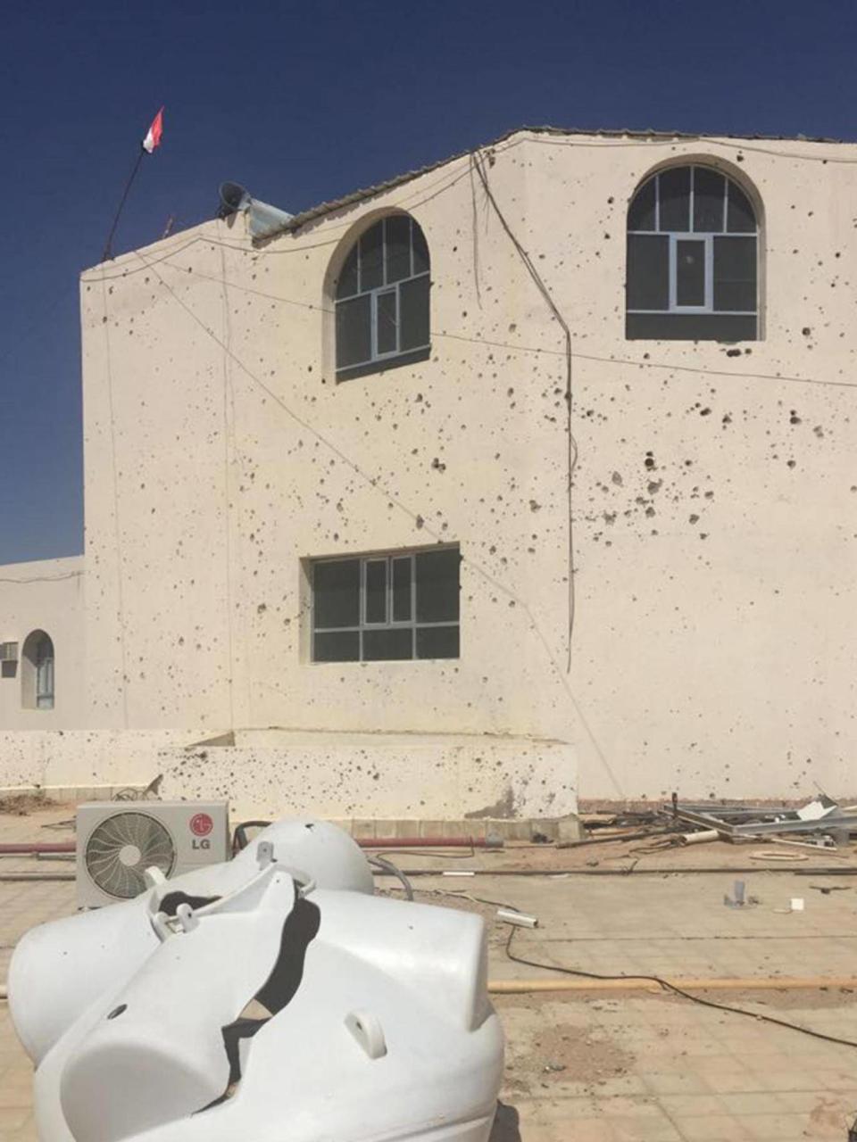 Bullet holes pockmark Marib General Hospital’s walls and roof (Bethan McKernan)