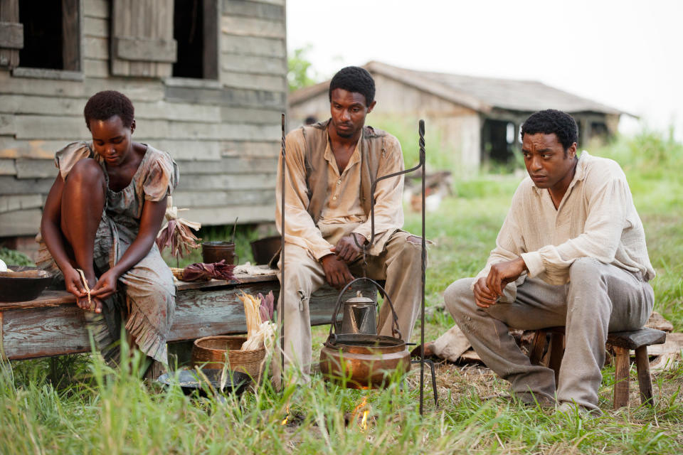 12 YEARS A SLAVE, Lupita Nyong'o (left), Chiwetel Ejiofor (right), 2013. ph: Francois Duhamel/TM and Copyright ©Fox Searchlight Pictures. All rights reserved./courtesy Everett Collection