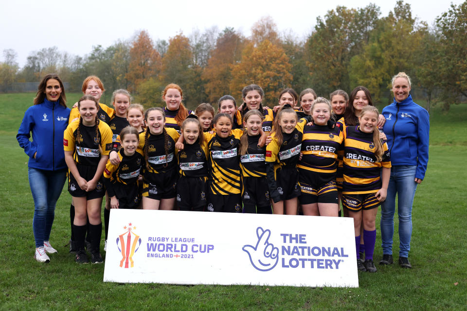 Women's Rugby League legends Rebecca Stevens and Jane Banks join children from Haydock ARLFC on the morning of the women's semi-finals to celebrate National Lottery support to rugby league at Haydock ARLFC on November 14, 2022 in St Helens, England. (Photo by George Wood/Getty Images for The National Lottery)