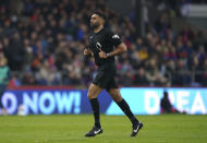 Referee Sunny Gill runs on the pitch, during the English Premier League soccer match between Crystal Palace and Luton Town, at Selhurst Park, in London, Saturday March 9, 2024. (Bradley Collyer/PA via AP)