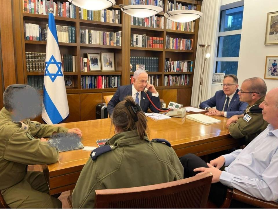 A handout image published by Netanyahu’s office shows the Israeli PM alongside senior military personnel earlier today (Prime Minister's Media Adviser)