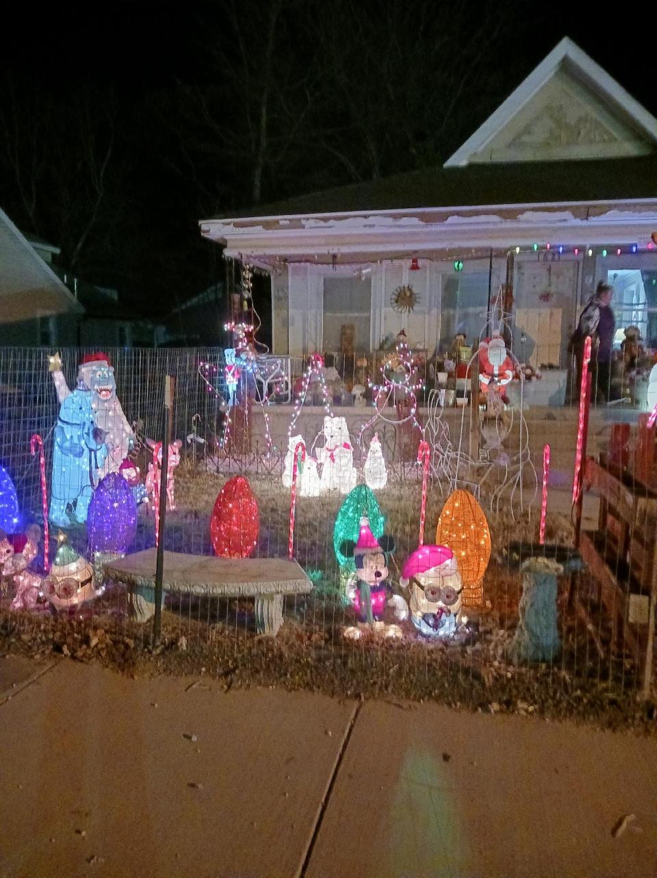 A collection of inflatables and light-up Christmas decorations covers Darren Vodopich's front lawn at 1621 E. Atlantic St.