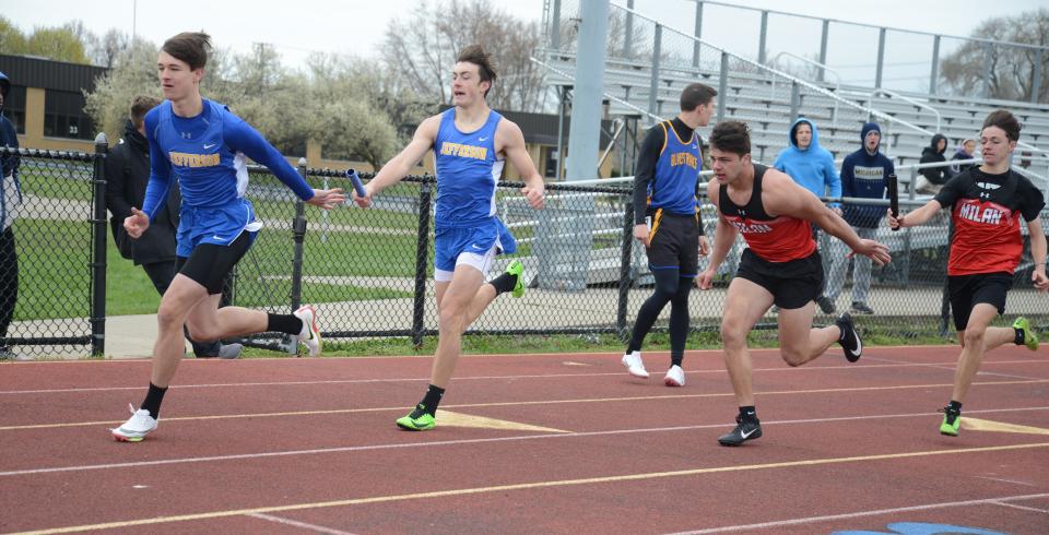 Jefferson and Milan battle for the lead on the final exchange of the boys 800-meter relay at the Jefferson Invitational Saturday. Noah Bussell gives to Cole McElanvy for Milan and Myles Tackett gives to Zach Maue for Jefferson.