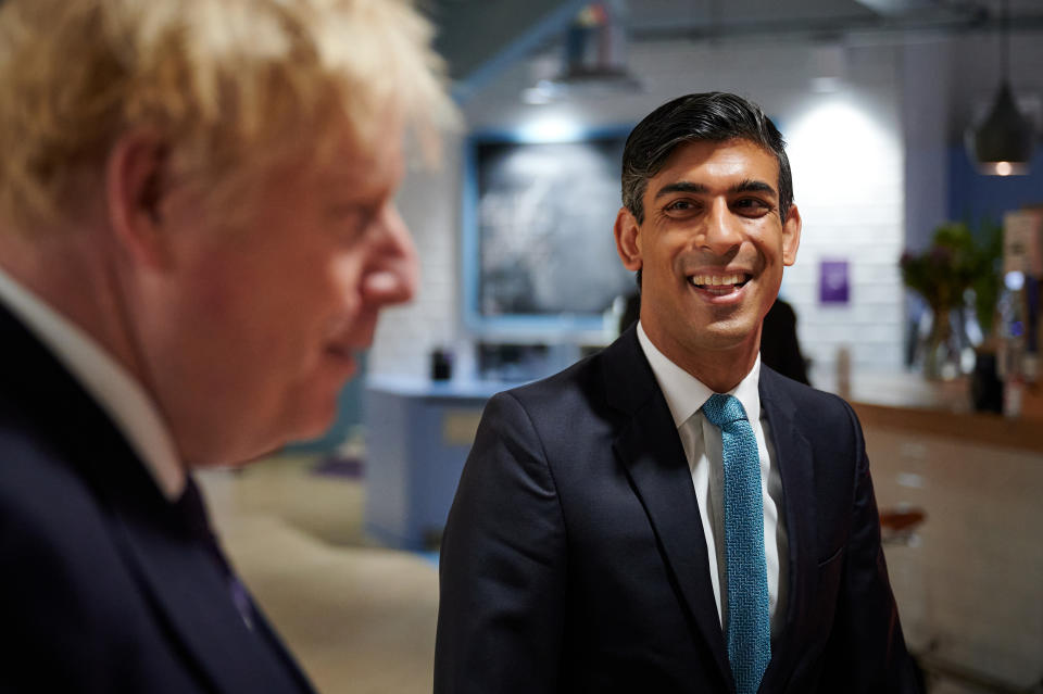 Prime Minister Boris Johnson and Chancellor of the Exchequer Rishi Sunak during a visit to the headquarters of Octopus Energy in London.