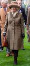 <p>The Duchess of Cornwall looked smart in a tweed coat, brown boots, and a fur lined hat to attend the Prince's Countryside Fund Racing Weekend at Ascot Racecourse. The duchess finished the look with a beige polka dot scarf, brown gloves, and a camel colored bag. </p>