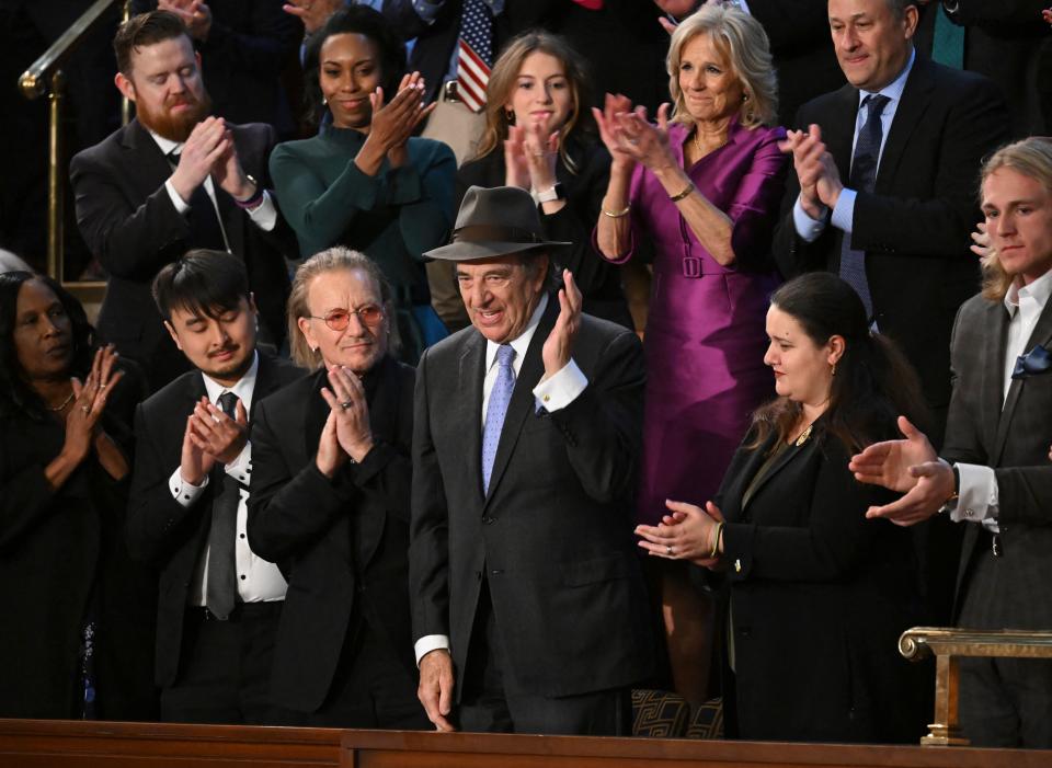 Paul Pelosi, husband of former Speaker of the House Nancy Pelosi (D-Calif.), acknowledges applause after President Joe Biden spoke about him during the State of the Union address on February 7, 2023. / Credit: SAUL LOEB/AFP via Getty Images