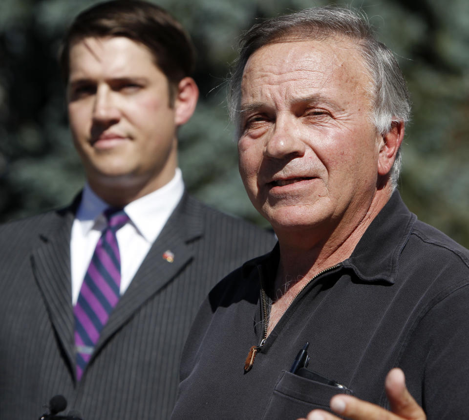 In this Oct. 2, 2012 photo, former Republican U.S. Rep. Tom Tancredo speaks out in favor supporting Amendment 64 to legalize marijuana in Colorado during a news conference at the Capitol in Denver. Joe Megyesy coordinator for the campaign to regulate marijuana like alcohol listens at left. Appealing to Western individualism and a mistrust of federal government, activists have lined up some prominent conservatives as natural allies to make pot legal, from one-time presidential hopefuls Tom Tancredo and Ron Paul to Libertarian presidential candidate and former New Mexico Gov. Gary Johnson. (AP Photo/Ed Andrieski)