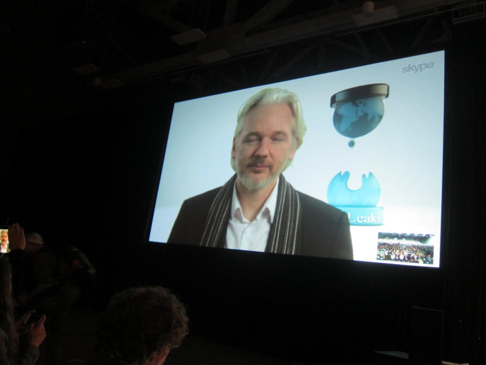 Fugitive WikLeaks founder Julian Assange speaks via Skype at the South By SouthWest Interactive festival in Austin, Texas, Saturday, March 8, 2014. Assange's appearance underscores the increasing attention that the technology industry is paying to issues of online privacy, security and surveillance. (AP Photo/Barbara Ortutay)