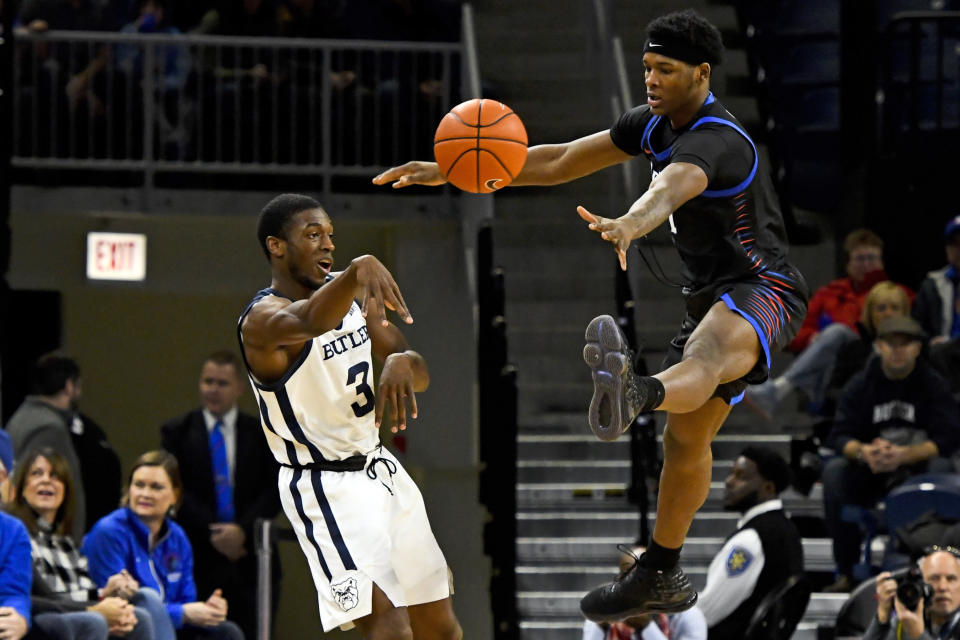 DePaul forward Romeo Weems, right, defends against Butler guard Kamar Baldwin (3) during the first half of an NCAA college basketball game Saturday, Jan. 18, 2020, in Chicago. (AP Photo/Matt Marton)