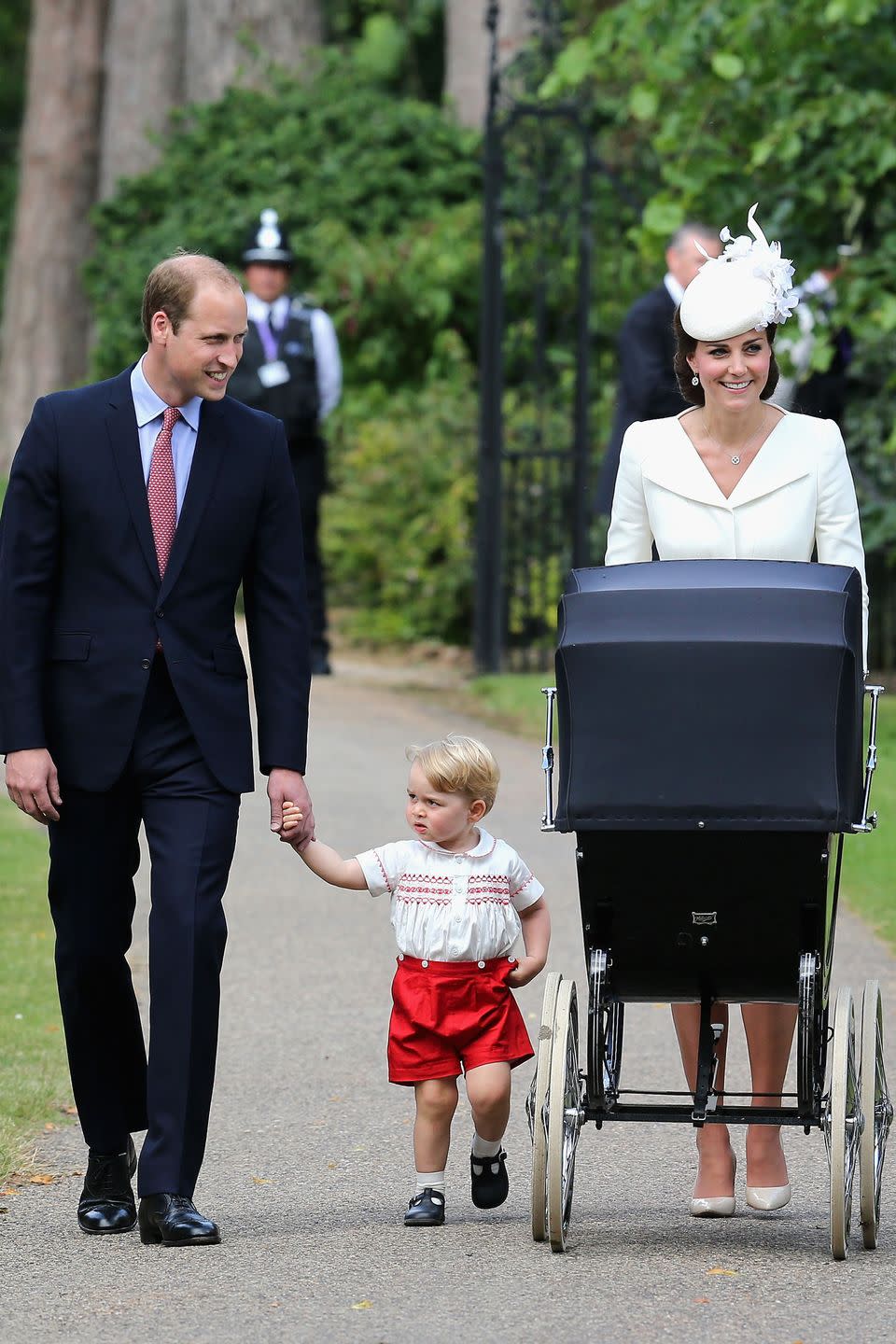 <p>Duchess Kate pushes Princess Charlotte in a stroller as her family arrives at the Church of St. Mary Magdalene for <a href="https://www.harpersbazaar.com/celebrity/latest/a22075363/kate-middleton-dress-prince-louis-christening-compared-prince-george-princess-charlotte/" rel="nofollow noopener" target="_blank" data-ylk="slk:Charlotte's christening;elm:context_link;itc:0;sec:content-canvas" class="link ">Charlotte's christening</a>. </p>