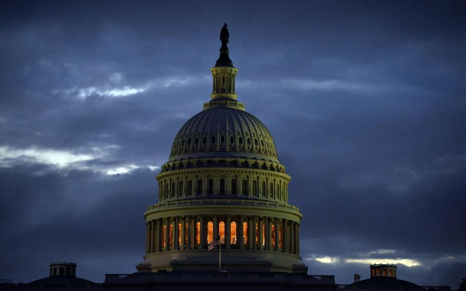 Congress is scrambling to determine how to respond to the crisis wracking the White House - Credit: JEWEL SAMAD/AFP/Getty Images