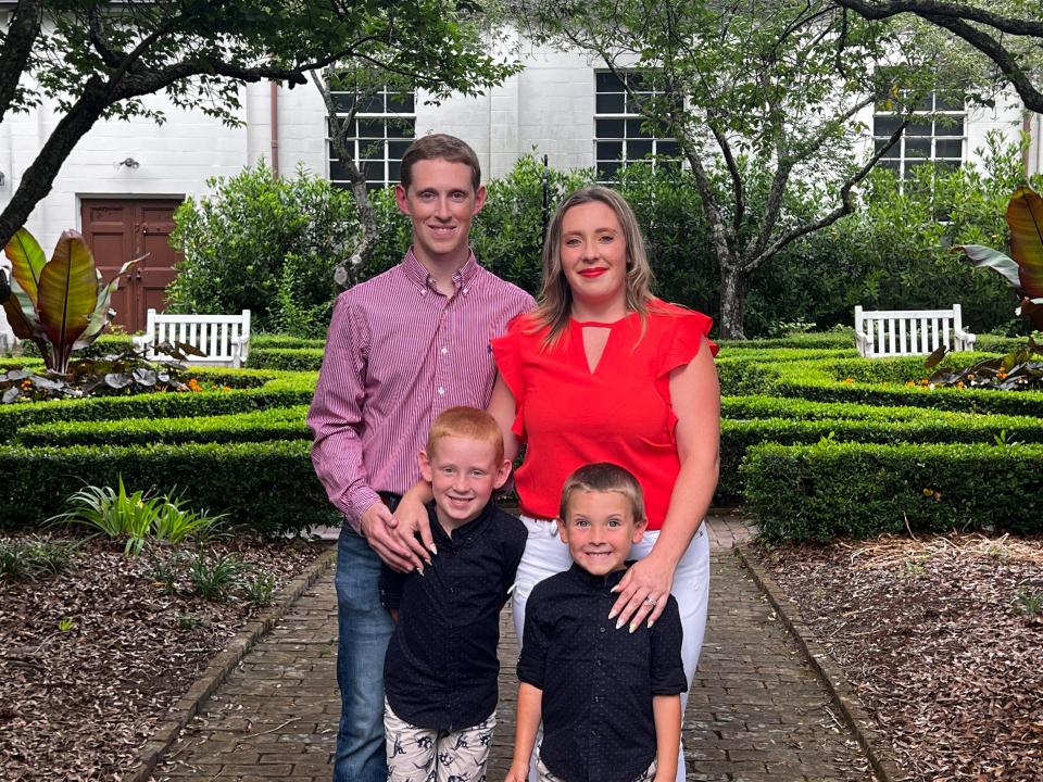 Local news editor Trevor Dunnell with his wife and two sons.