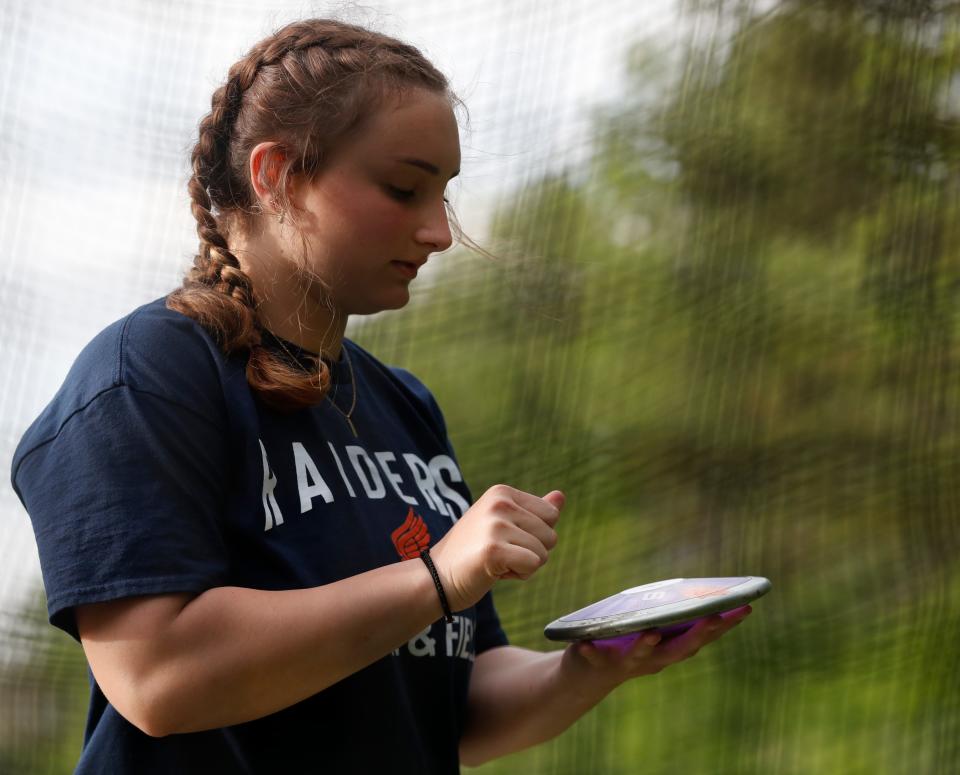 Harrison Asra Foley prepares to throw the discus during the IHSAA girls track and field sectional meet, Tuesday, May 16, 2023, at Harrison High School in West Lafayette, Ind. 