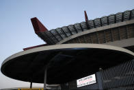 A notice outside San Siro stadium advising that the Serie A soccer match between Inter and Sampdoria is cancelled, in Milan, Italy, Sunday, Feb. 23, 2020. In Lombardy, the hardest-hit region by the spread of the Coronavirus with 90 cases, schools and universities were ordered to stay closed in the coming days, and sporting events were canceled. Lombardy's ban on public events also extended to Masses in churches in the predominantly Roman Catholic nation. (AP Photo/Antonio Calanni)