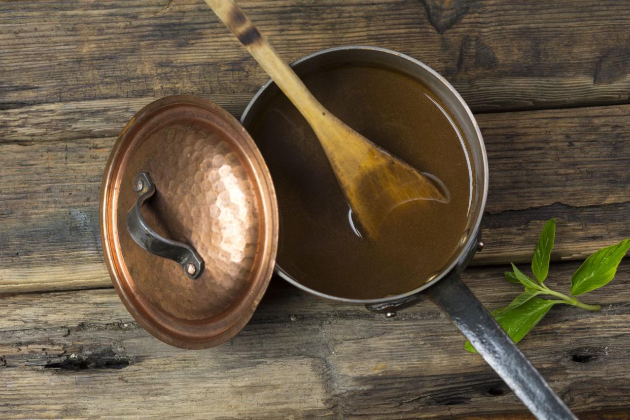 Gravy in a copper pot top view