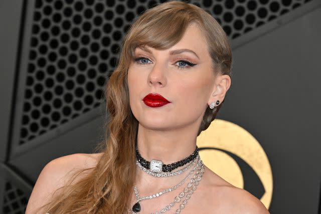 <p>ROBYN BECK/AFP via Getty</p> Taylor Swift at the Grammys in Los Angeles on February 4, 2024