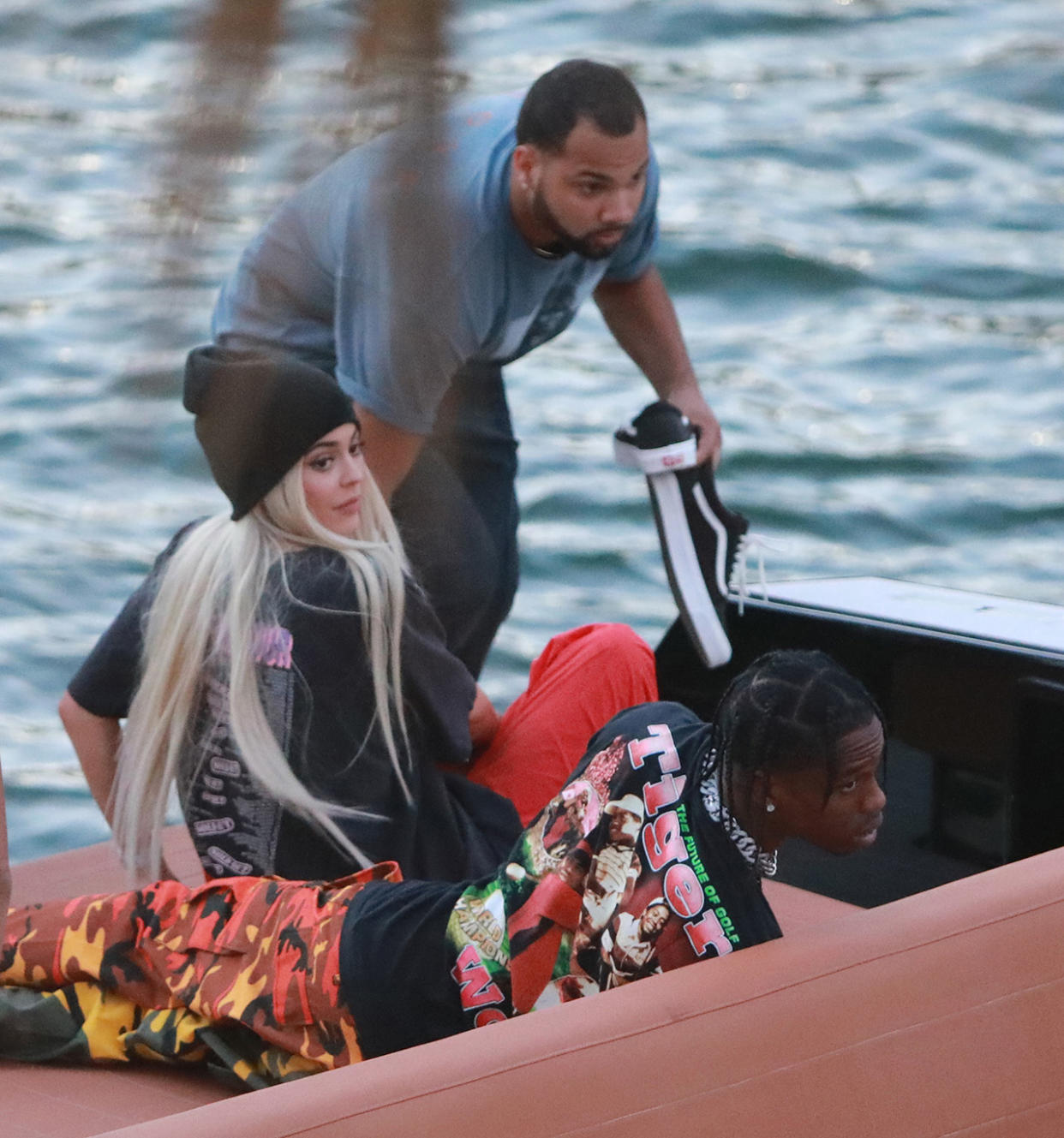EXCLUSIVE: Kylie Jenner goes back to being a blonde (like she was with X-Boyfriend Tyga) seen here are the first pictures of a very "BLONDE" Kylie Jenner and her new boyfriend Jacques Webster, Jr. better know as hip-hop singer Travis Scott. The lovebirds arrived by yacht and dined in a private back room of the exclusive restaurant the River Yacht Club where Kylie and Travis looked very happy and were spotted kissing and being very romantic while bodyguards kept out unwanted people. The new couple had a blast at the exclusive waterside restaurant where they were joined by Miami-based restaurant, nightlife and hospitality entrepreneur David Grutman and his wife Isabela Rangel. While Kylie drank Evian water all night her new man Rapper Travis Scott was in full party mode and did a total of 17 shots of Don Julio 1942â„¢- World's First Luxury Tequilaâ€Ž with their friends. Perhaps the Tequila took its toll, as Travis looked a little under the weather on the boat ride home. The couple spent a total of $2000.00 with their friends and left a very generous additional $100.00 in addition to the 20% tip at The River Yacht Club Restaurant in Miami on May 7, 2017 in Miami, Florida. 07 May 2017 Pictured: Kylie Jenner, Travis-Scott. Photo credit: TBA / MEGA TheMegaAgency.com +1 888 505 6342 (Mega Agency TagID: MEGA34150_011.jpg) [Photo via Mega Agency]