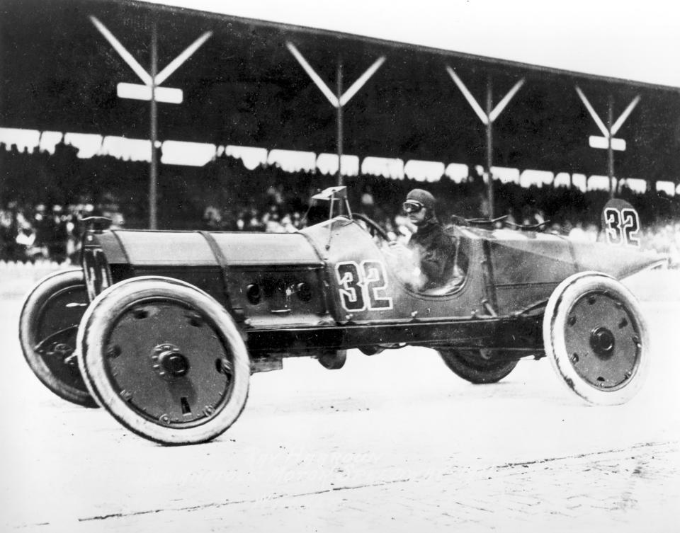 FILE - In this May 30, 1911, file photo, Ray Harroun wheels his No. 32 Marmon Wasp race car to victory in the inaugural Indianapolis 500-mile race, called the International 500 Mile Sweepstakes, at Indianapolis Motor Speedway in Indianapolis, Ind. The Indianapolis 500 scheduled for May 24 has been postponed until August because of the coronavirus pandemic and won't run on Memorial Day weekend for the first time since 1946. The race will instead be held Aug. 23. The Indianapolis 500 began in 1911. (AP Photo/File)