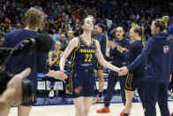 CORRECTS FROM CAITLYN TO CAITLIN - Indiana Fever guard Caitlin Clark (22) is introduced during the first half of an WNBA basketball game against the Dallas Wings in Arlington, Texas, Friday, May 3, 2024. (AP Photo/Michael Ainsworth)