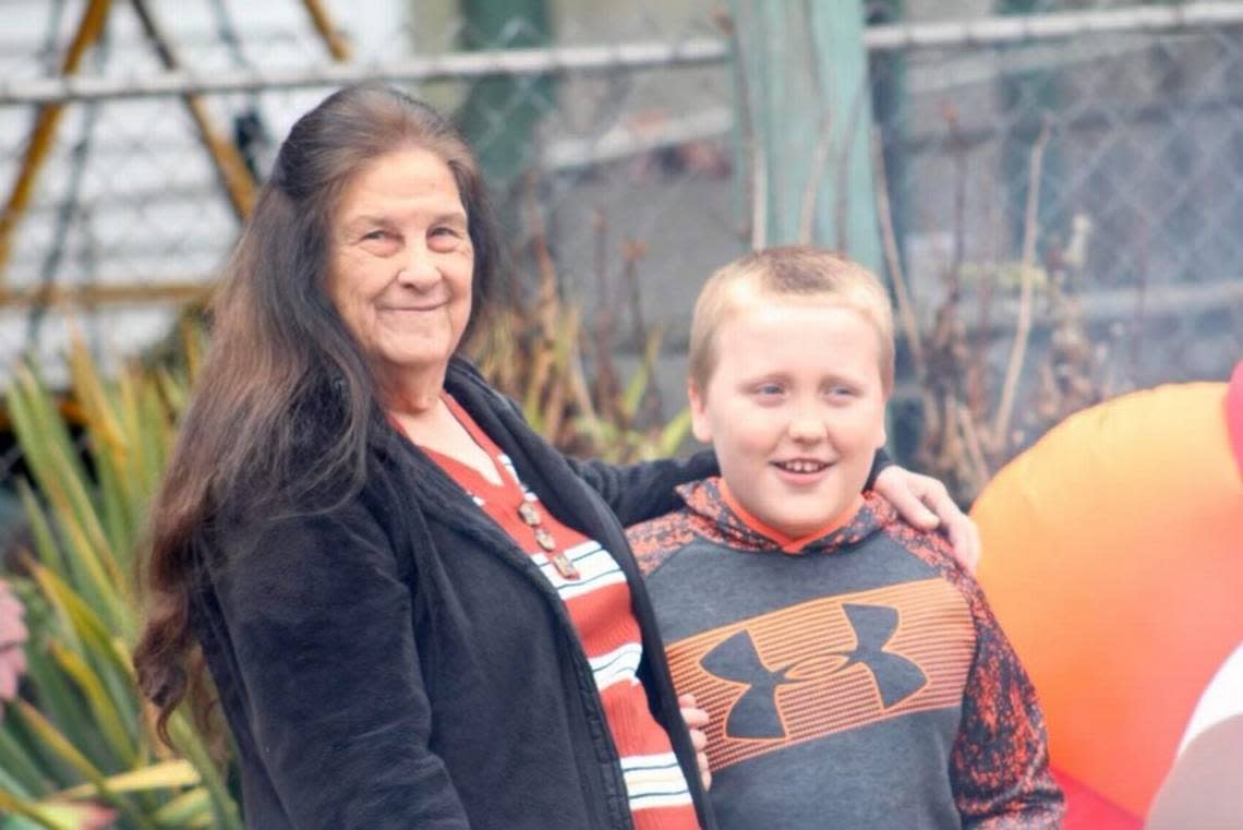 Nellie Mae Howard, 82, and her great-grandson Connor Smith. Howard, the great-aunt of Perry Sheriff Joe Engle, was the first confirmed death in the county