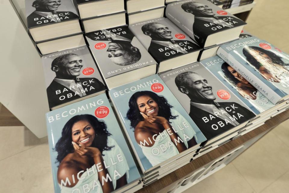 Barack and Michelle Obama's memoirs side by side in a bookstore